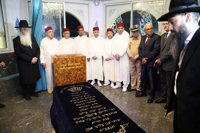 Moroccan Jewish Hiloula pilgrimage — families and worshippers gathering at a saint's tomb in Morocco